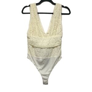Lulu’s White Plung Lace Thong Bodysuit